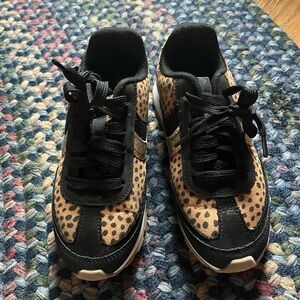 Girls cheetah print sneakers.  Gently worn.  No holes or stains.